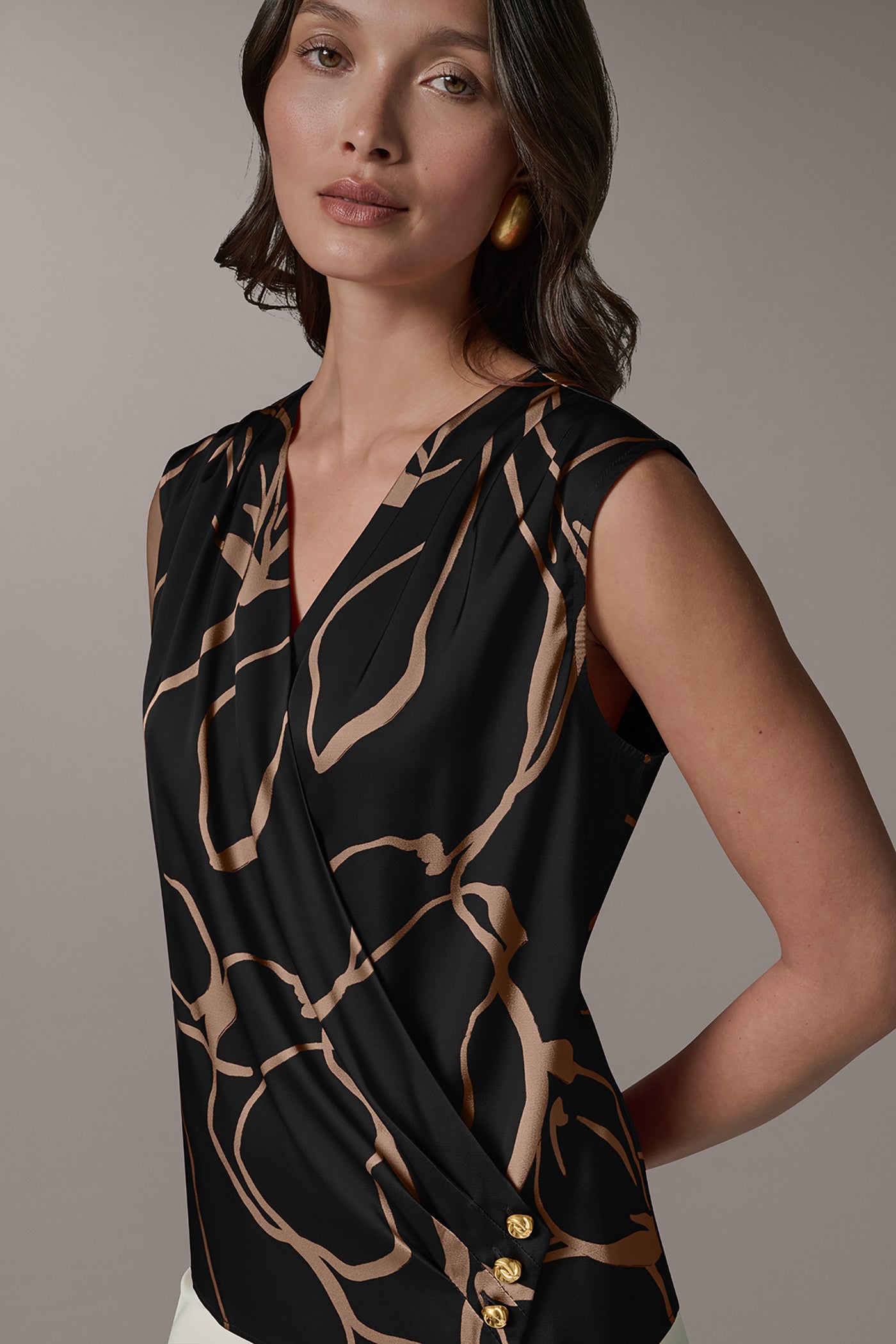 SLEEVELESS WRAP EFFECT PRINT BLOUSE